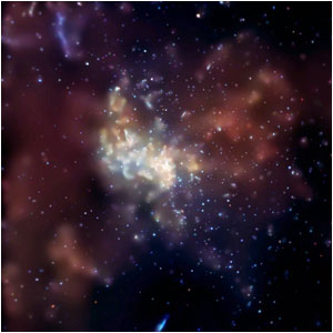 Streamers of stars and gas orbit the central black hole in this false-color image, which combines views in infrared and radio wavelengths. [NRAO/AUI]